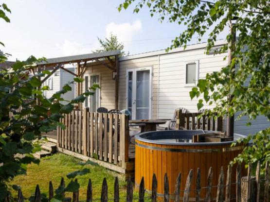 Bungalow ZEN 30 m² with NORDIC BATH and semi-covered wooden terrace