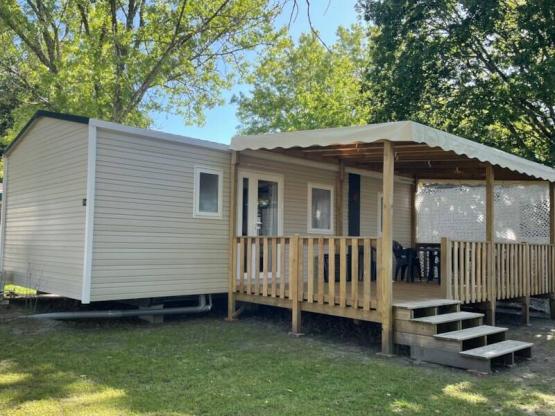 Stacaravan Premium - 32m² - Airco -  2 slaapkamers - overdekt terras -