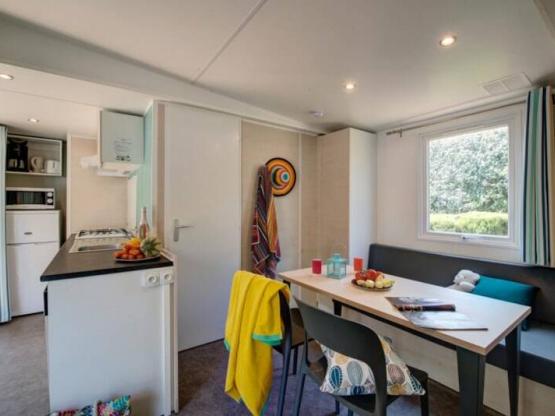 Comfort stacaravan 35m² (3 slaapkamers – 6 personen) + terras + TV + vaatwasser + airconditioning