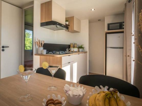 Stacaravan - 29 m²,airconditioning , WC, douche, terras