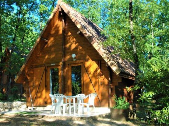 De echte houten dubbelzijdig cottage.