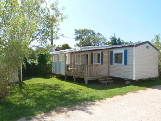 Mobil-home (3 chambres) 32 m² + terrasse couverte  Année 2009 Côté Grande Côte -